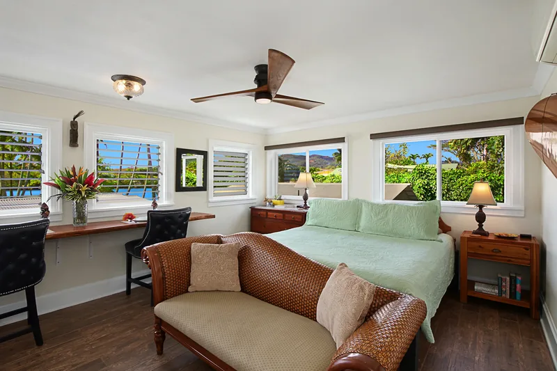 Bedroom with tropical decor at Fern Grotto Inn, Kapaa, Kauai