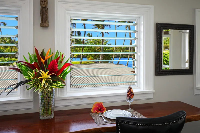 Dining area with tropical views at Fern Grotto Inn, Kauai