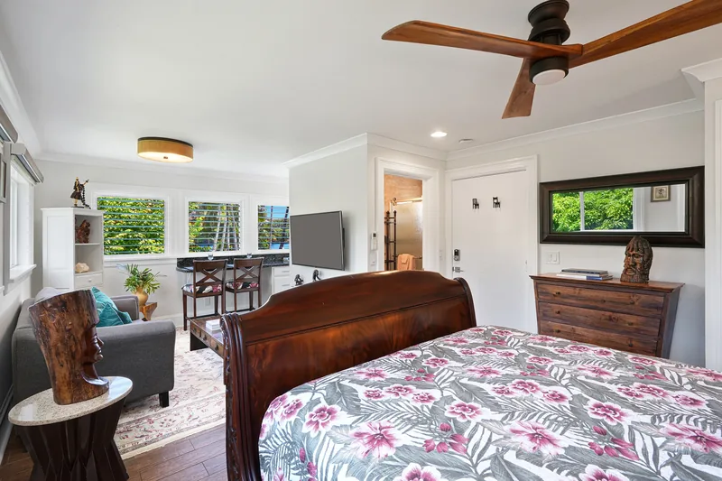 Bedroom with tropical decor at Fern Grotto Inn, Kapaa, Kauai