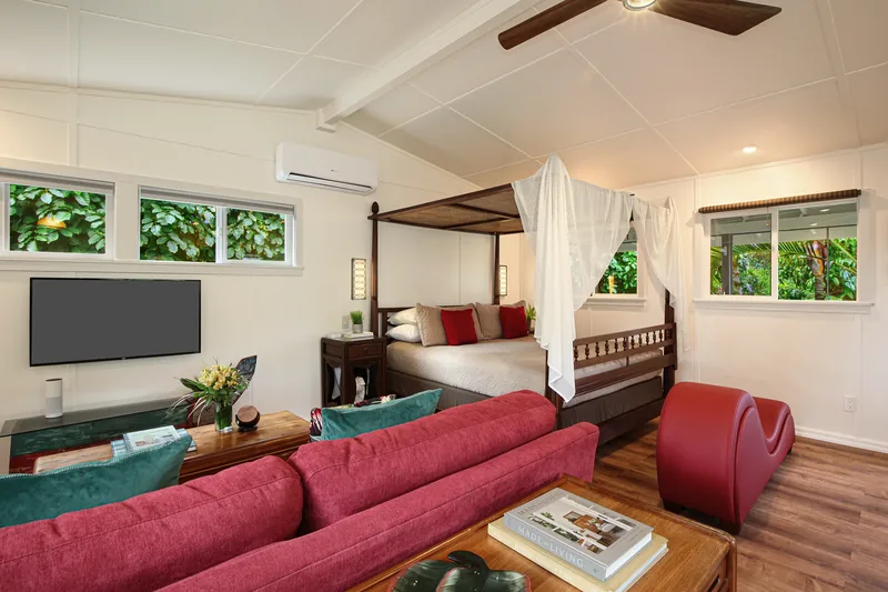 Bedroom with tropical decor at Fern Grotto Inn, Kapaa, Kauai